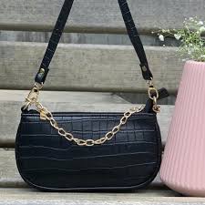 Handbags CHL Collection