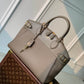 M22914 Lock It MM Gray Handbag