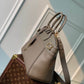 M22914 Lock It MM Gray Handbag