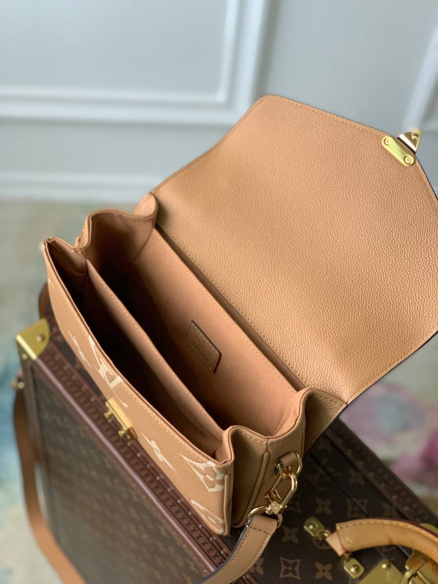 M45773 Pochette Metis Monogram Empreinte shoulder cross body bag brown