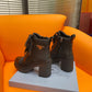 PRADA LOGO PLAQUE ANKLE BOOTS BLACK