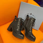 PRADA LOGO PLAQUE ANKLE BOOTS BLACK