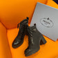 PRADA LOGO PLAQUE ANKLE BOOTS BLACK