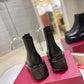 VALENTINO GARAVANI UNIQUEFORM V LOGO LEATHER PLATFORM BOOTS BLACK