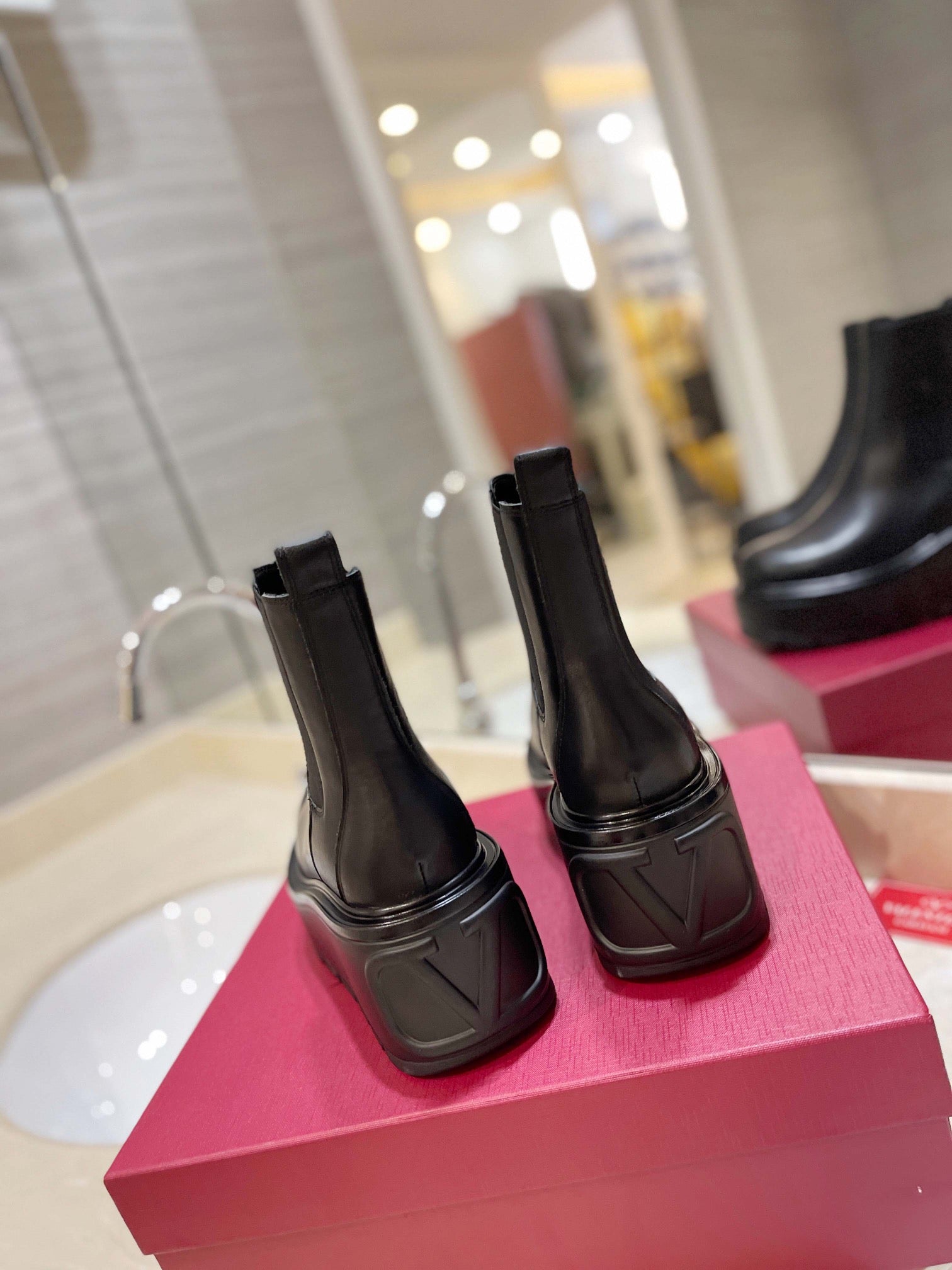VALENTINO GARAVANI UNIQUEFORM V LOGO LEATHER PLATFORM BOOTS BLACK