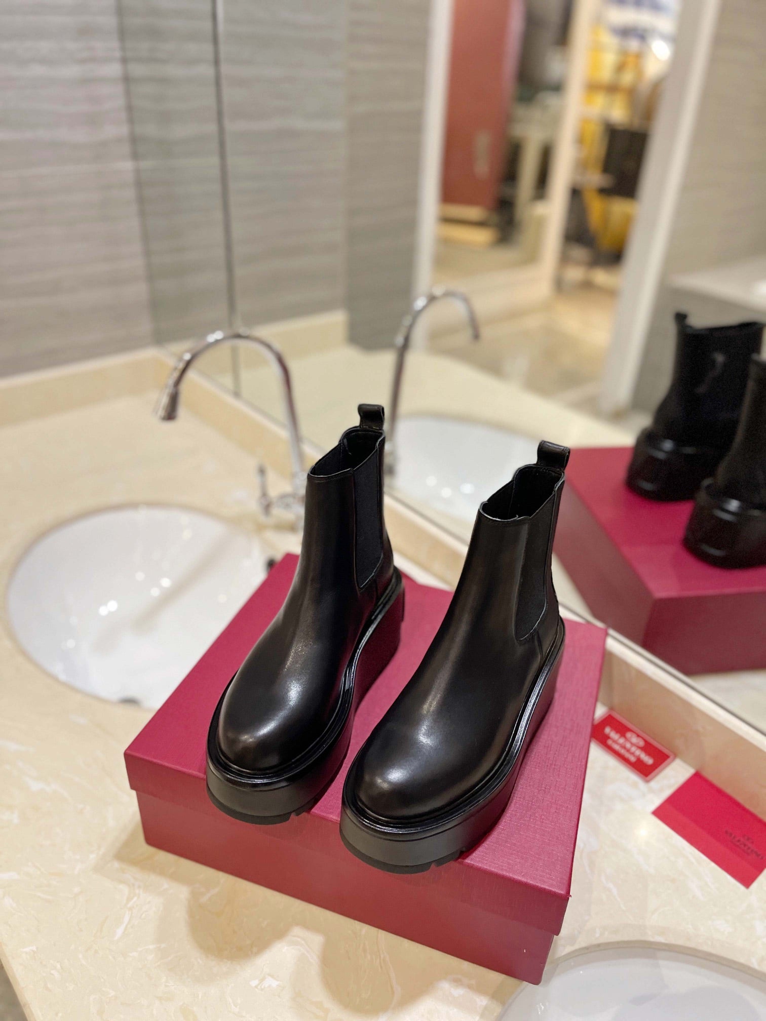 VALENTINO GARAVANI UNIQUEFORM V LOGO LEATHER PLATFORM BOOTS BLACK