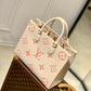 M21575 OnTheGo MM Monogram Empreinte leather apricot 35cm