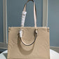 M45595 OnTheGo MM Monogram Empreinte leather white 35cm
