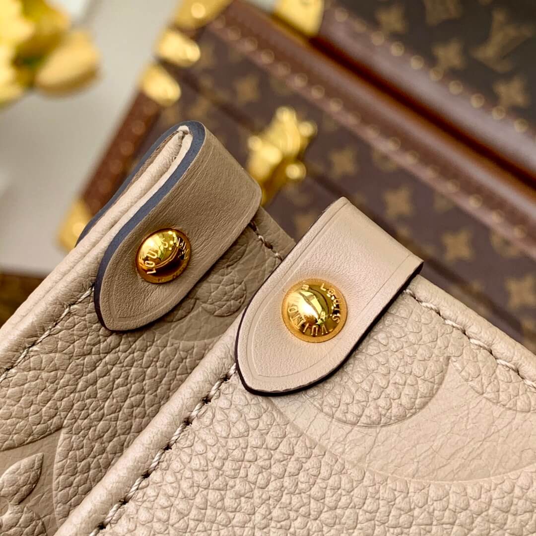 M45660 ONTHEGO PM tote bag Oversized monogrm empreinte leather Apricot